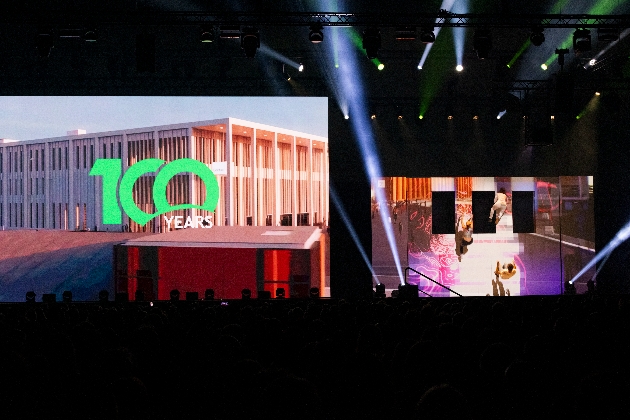 stage at a conference marking 100 years