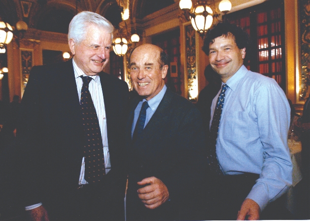 Three men in suita and ties